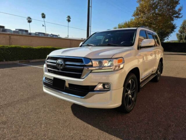 Белый Тойота Ленд Крузер 100, объемом двигателя 5.7 л и пробегом 80 тыс. км за 32000 $, фото 2 на Automoto.ua