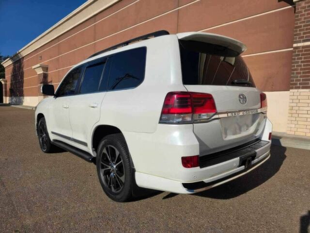 Белый Тойота Ленд Крузер 100, объемом двигателя 5.7 л и пробегом 80 тыс. км за 32000 $, фото 4 на Automoto.ua