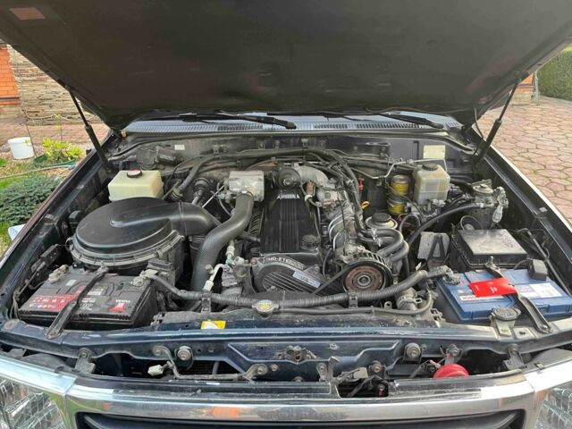 Белый Тойота Ленд Крузер 100, объемом двигателя 2.5 л и пробегом 683 тыс. км за 9550 $, фото 2 на Automoto.ua