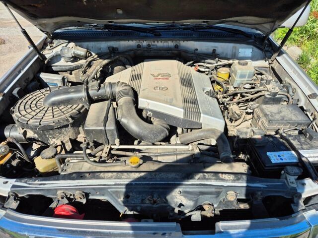 Бежевый Тойота Ленд Крузер 100, объемом двигателя 4.7 л и пробегом 360 тыс. км за 13600 $, фото 11 на Automoto.ua