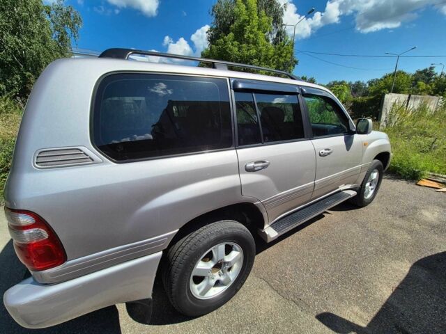 Бежевый Тойота Ленд Крузер 100, объемом двигателя 4.7 л и пробегом 360 тыс. км за 13600 $, фото 2 на Automoto.ua