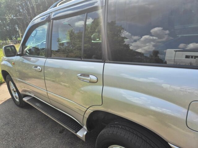 Бежевый Тойота Ленд Крузер 100, объемом двигателя 4.7 л и пробегом 360 тыс. км за 13600 $, фото 4 на Automoto.ua