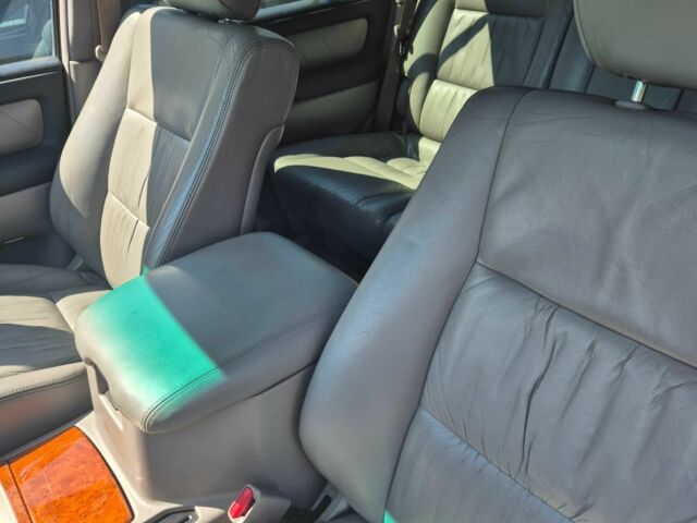 Бежевый Тойота Ленд Крузер 100, объемом двигателя 4.7 л и пробегом 360 тыс. км за 13600 $, фото 8 на Automoto.ua