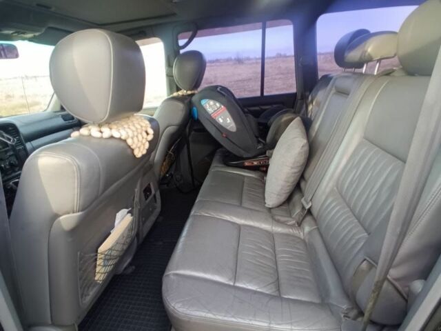 Черный Тойота Ленд Крузер 100, объемом двигателя 4.7 л и пробегом 442 тыс. км за 10000 $, фото 2 на Automoto.ua