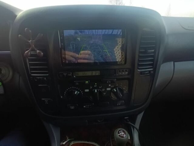 Черный Тойота Ленд Крузер 100, объемом двигателя 4.7 л и пробегом 442 тыс. км за 10000 $, фото 1 на Automoto.ua