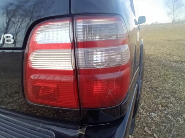 Черный Тойота Ленд Крузер 100, объемом двигателя 4.7 л и пробегом 442 тыс. км за 10000 $, фото 4 на Automoto.ua