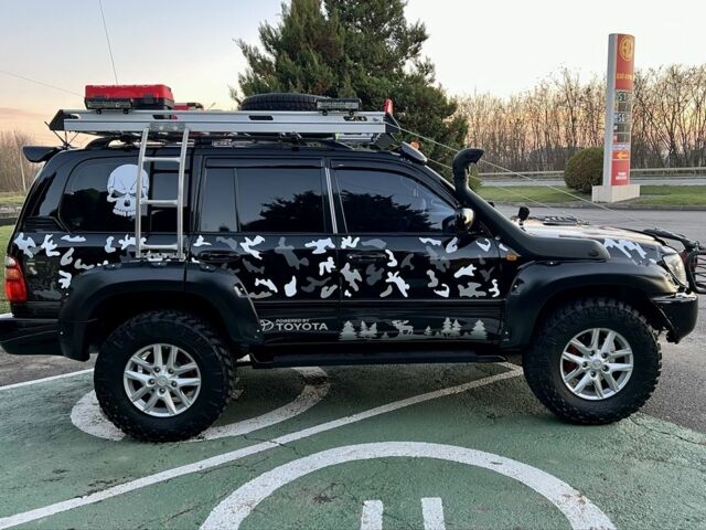 Чорний Тойота Ленд Крузер 100, об'ємом двигуна 4.7 л та пробігом 430 тис. км за 25000 $, фото 4 на Automoto.ua