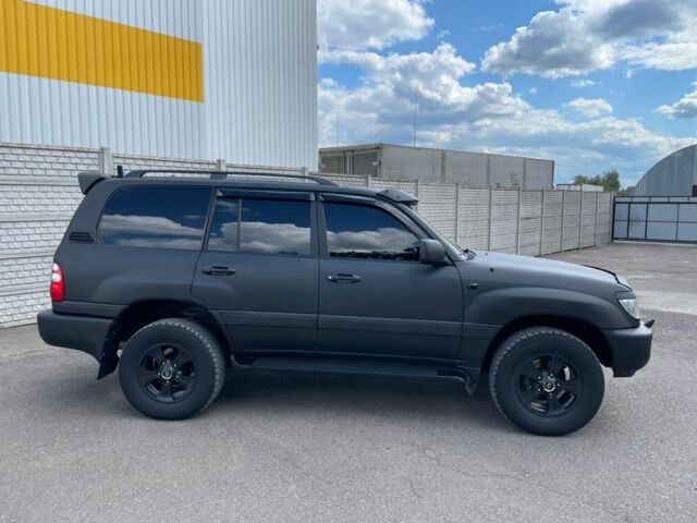 Черный Тойота Ленд Крузер 100, объемом двигателя 4.7 л и пробегом 386 тыс. км за 16800 $, фото 2 на Automoto.ua