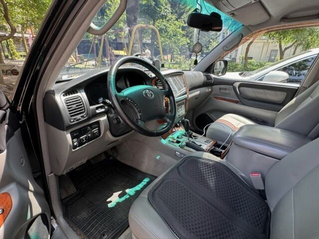 Черный Тойота Ленд Крузер 100, объемом двигателя 4.7 л и пробегом 454 тыс. км за 16500 $, фото 3 на Automoto.ua