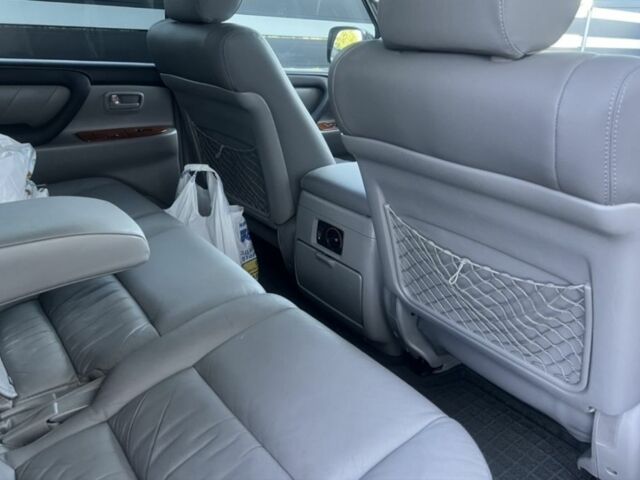 Черный Тойота Ленд Крузер 100, объемом двигателя 4.7 л и пробегом 392 тыс. км за 17000 $, фото 2 на Automoto.ua