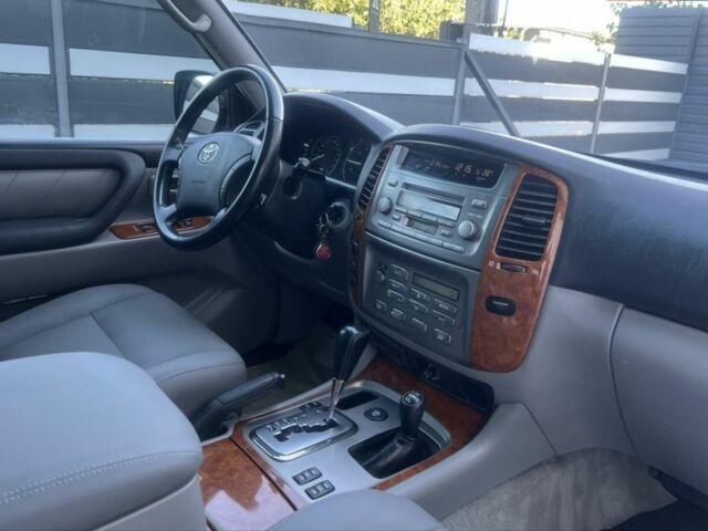 Черный Тойота Ленд Крузер 100, объемом двигателя 4.7 л и пробегом 392 тыс. км за 17000 $, фото 3 на Automoto.ua