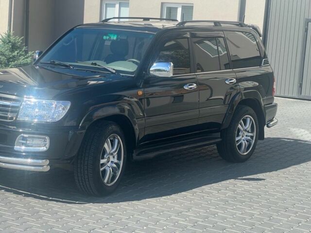 Черный Тойота Ленд Крузер 100, объемом двигателя 4.5 л и пробегом 341 тыс. км за 13499 $, фото 1 на Automoto.ua