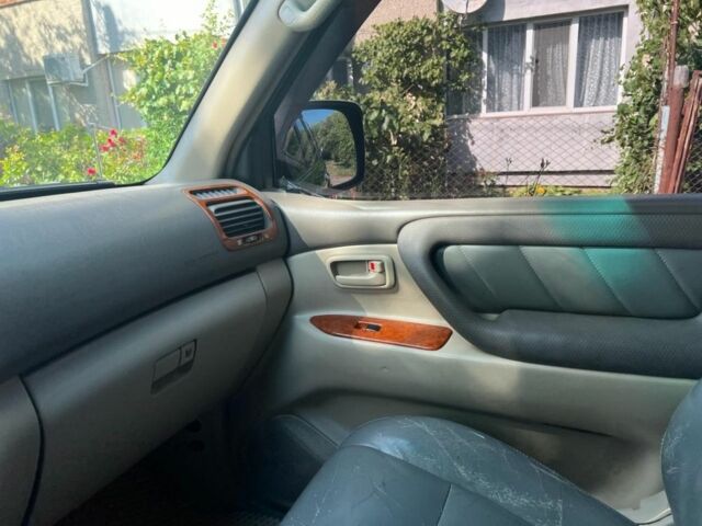 Черный Тойота Ленд Крузер 100, объемом двигателя 4.5 л и пробегом 341 тыс. км за 13499 $, фото 19 на Automoto.ua