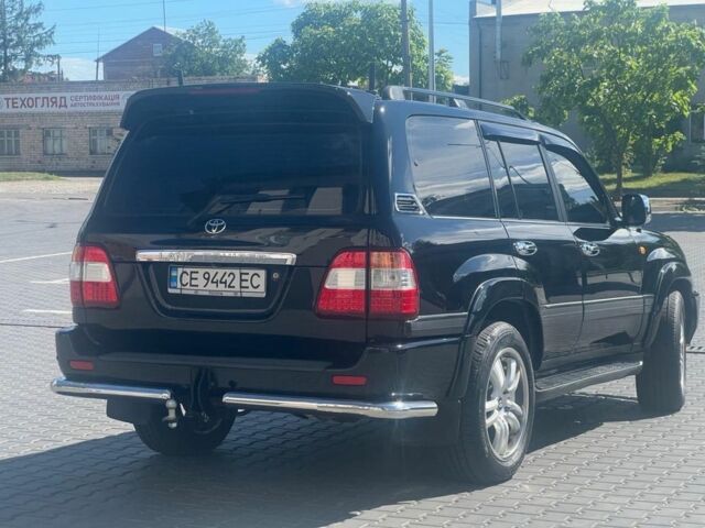 Черный Тойота Ленд Крузер 100, объемом двигателя 4.5 л и пробегом 341 тыс. км за 13499 $, фото 4 на Automoto.ua