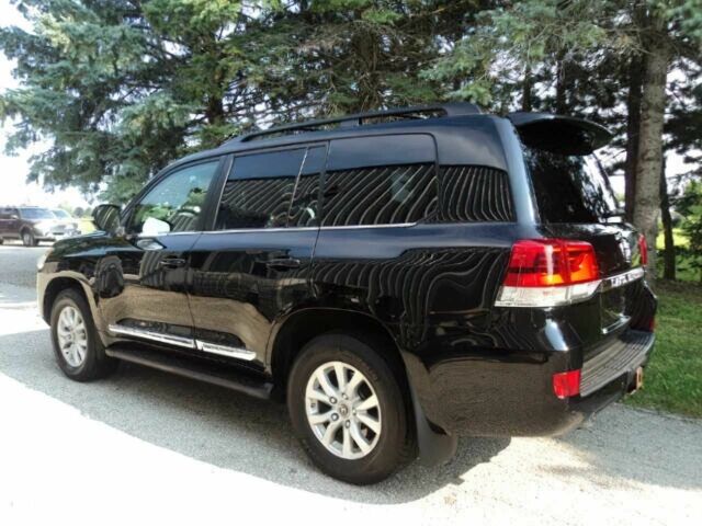 Черный Тойота Ленд Крузер 100, объемом двигателя 5.7 л и пробегом 65 тыс. км за 8500 $, фото 3 на Automoto.ua