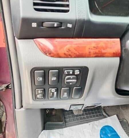 Красный Тойота Ленд Крузер 100, объемом двигателя 3 л и пробегом 240 тыс. км за 3121 $, фото 7 на Automoto.ua