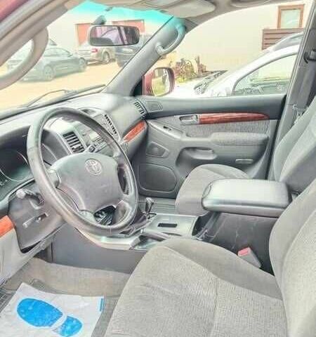 Красный Тойота Ленд Крузер 100, объемом двигателя 3 л и пробегом 240 тыс. км за 3121 $, фото 4 на Automoto.ua