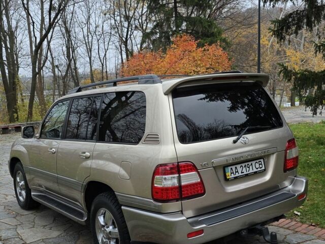 Желтый Тойота Ленд Крузер 100, объемом двигателя 4.7 л и пробегом 99 тыс. км за 35000 $, фото 2 на Automoto.ua