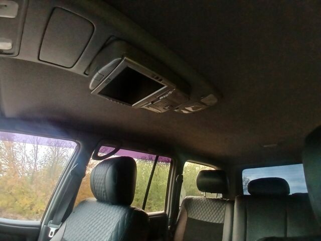 Серый Тойота Ленд Крузер 100, объемом двигателя 4 л и пробегом 459 тыс. км за 12300 $, фото 10 на Automoto.ua