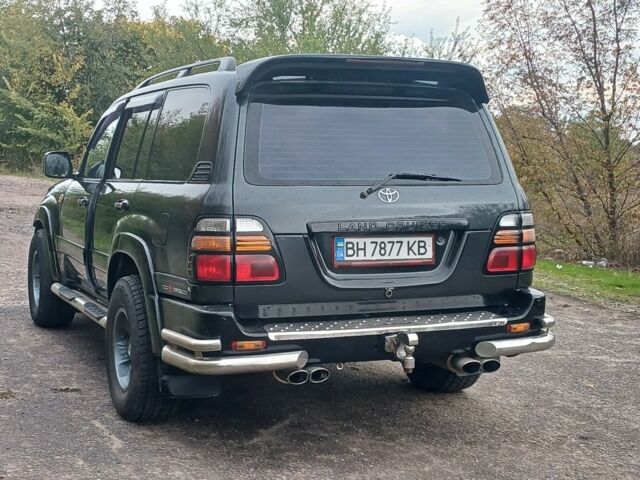 Серый Тойота Ленд Крузер 100, объемом двигателя 4 л и пробегом 459 тыс. км за 12300 $, фото 3 на Automoto.ua