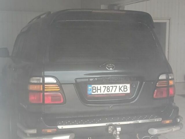 Серый Тойота Ленд Крузер 100, объемом двигателя 4 л и пробегом 459 тыс. км за 12300 $, фото 11 на Automoto.ua