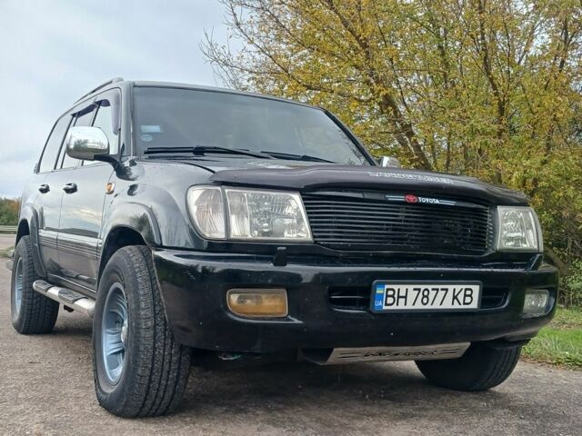 Серый Тойота Ленд Крузер 100, объемом двигателя 4 л и пробегом 459 тыс. км за 12300 $, фото 4 на Automoto.ua