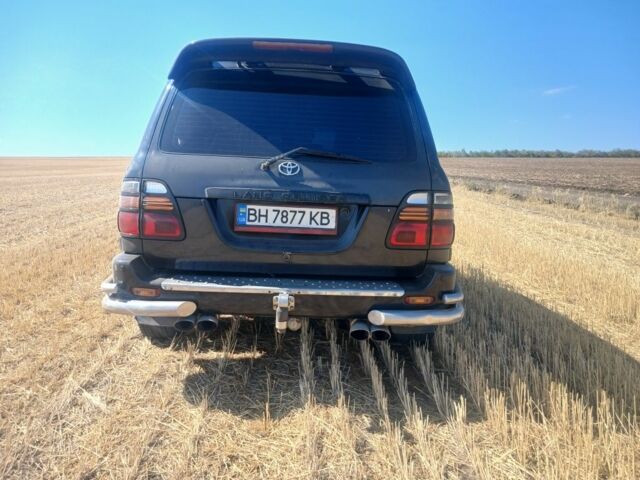 Серый Тойота Ленд Крузер 100, объемом двигателя 4 л и пробегом 459 тыс. км за 12300 $, фото 2 на Automoto.ua
