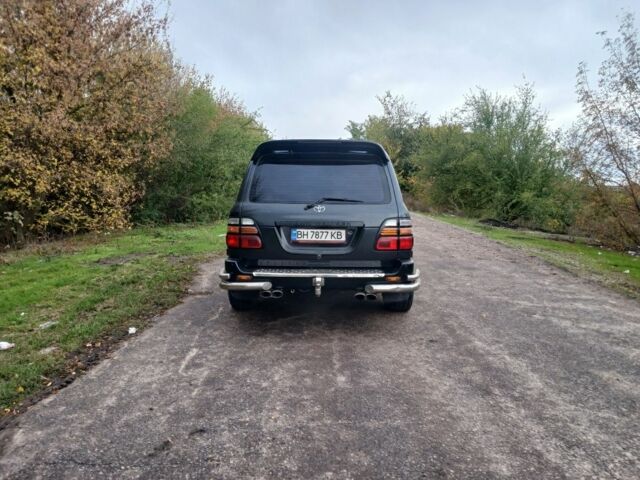 Серый Тойота Ленд Крузер 100, объемом двигателя 4 л и пробегом 459 тыс. км за 12300 $, фото 5 на Automoto.ua