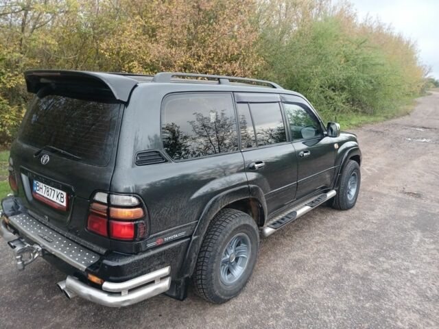 Серый Тойота Ленд Крузер 100, объемом двигателя 4 л и пробегом 459 тыс. км за 12300 $, фото 7 на Automoto.ua