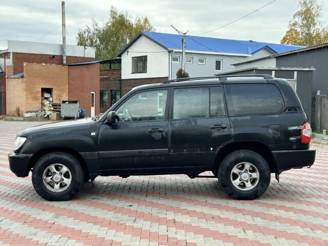 Серый Тойота Ленд Крузер 100, объемом двигателя 4.7 л и пробегом 300 тыс. км за 5950 $, фото 1 на Automoto.ua