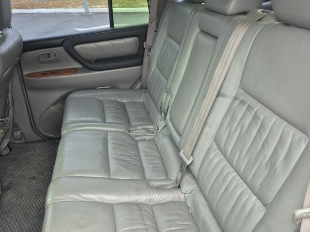 Серый Тойота Ленд Крузер 100, объемом двигателя 4.2 л и пробегом 437 тыс. км за 18800 $, фото 7 на Automoto.ua