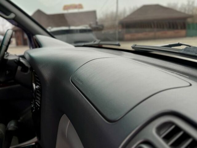 Серый Тойота Ленд Крузер 100, объемом двигателя 4.7 л и пробегом 390 тыс. км за 11650 $, фото 11 на Automoto.ua