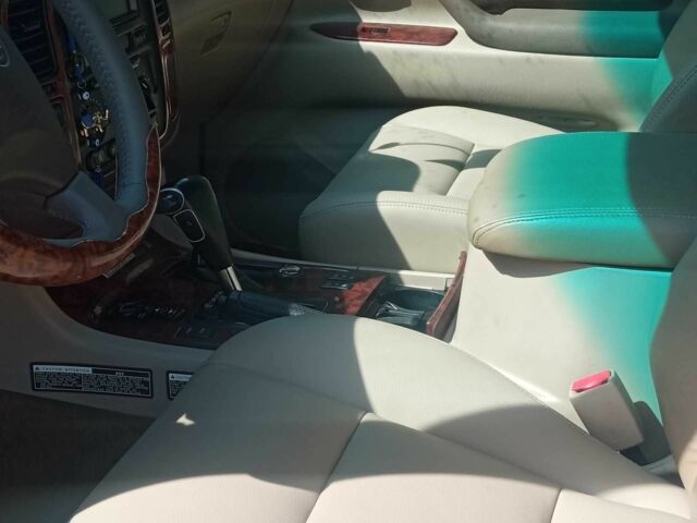 Серый Тойота Ленд Крузер 100, объемом двигателя 4.7 л и пробегом 430 тыс. км за 11200 $, фото 6 на Automoto.ua