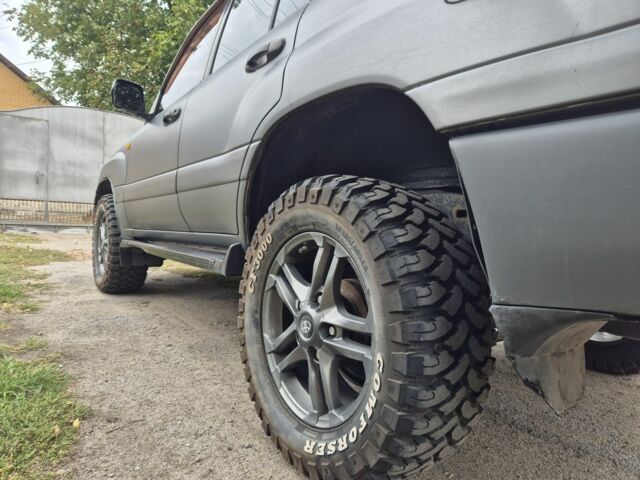 Серый Тойота Ленд Крузер 100, объемом двигателя 4.2 л и пробегом 453 тыс. км за 16500 $, фото 7 на Automoto.ua