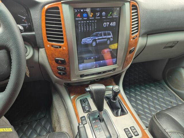 Серый Тойота Ленд Крузер 100, объемом двигателя 4.2 л и пробегом 453 тыс. км за 16500 $, фото 16 на Automoto.ua