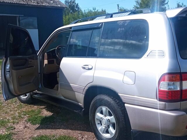 Серый Тойота Ленд Крузер 100, объемом двигателя 4.7 л и пробегом 430 тыс. км за 11200 $, фото 1 на Automoto.ua