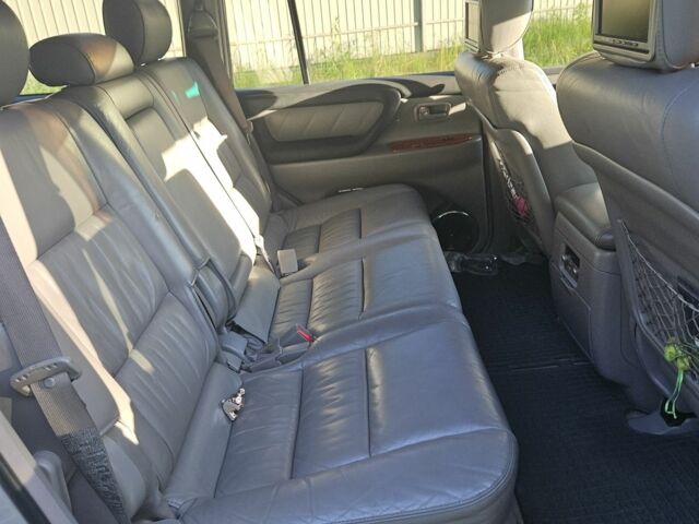 Серый Тойота Ленд Крузер 100, объемом двигателя 4.7 л и пробегом 265 тыс. км за 16700 $, фото 18 на Automoto.ua