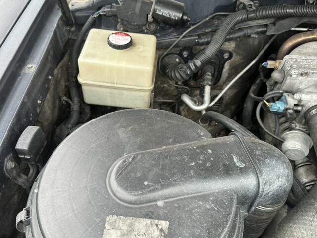 Синий Тойота Ленд Крузер 100, объемом двигателя 4.2 л и пробегом 225 тыс. км за 16000 $, фото 12 на Automoto.ua