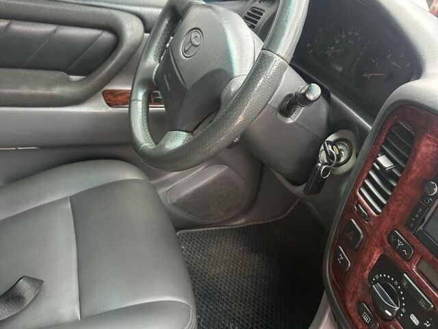 Синий Тойота Ленд Крузер 100, объемом двигателя 4.2 л и пробегом 225 тыс. км за 16000 $, фото 4 на Automoto.ua