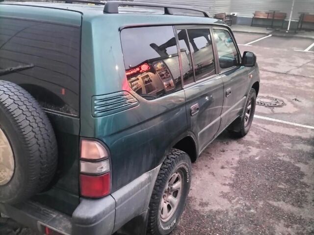 Зеленый Тойота Ленд Крузер 100, объемом двигателя 3 л и пробегом 440 тыс. км за 6000 $, фото 7 на Automoto.ua