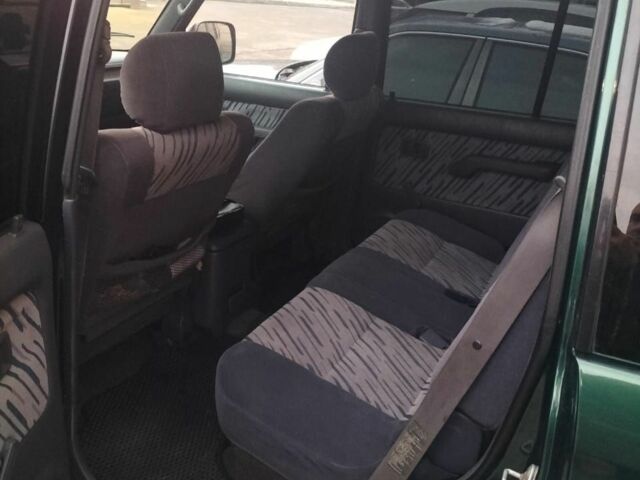 Зеленый Тойота Ленд Крузер 100, объемом двигателя 3 л и пробегом 440 тыс. км за 6000 $, фото 6 на Automoto.ua