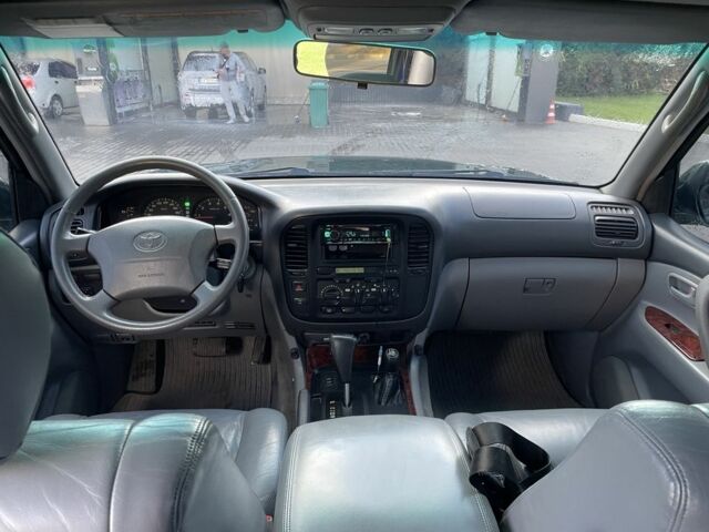 Зеленый Тойота Ленд Крузер 100, объемом двигателя 4.7 л и пробегом 300 тыс. км за 12000 $, фото 5 на Automoto.ua