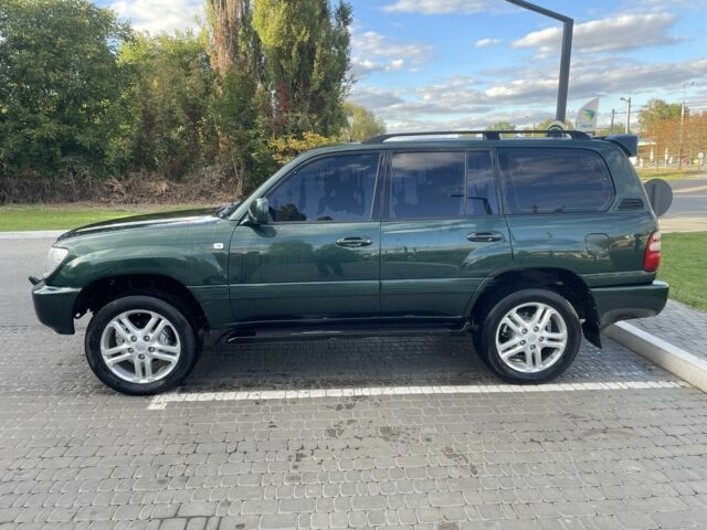 Зеленый Тойота Ленд Крузер 100, объемом двигателя 4.7 л и пробегом 300 тыс. км за 12000 $, фото 3 на Automoto.ua