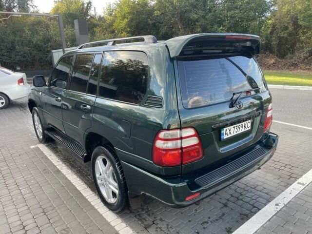 Зеленый Тойота Ленд Крузер 100, объемом двигателя 4.7 л и пробегом 300 тыс. км за 12000 $, фото 4 на Automoto.ua