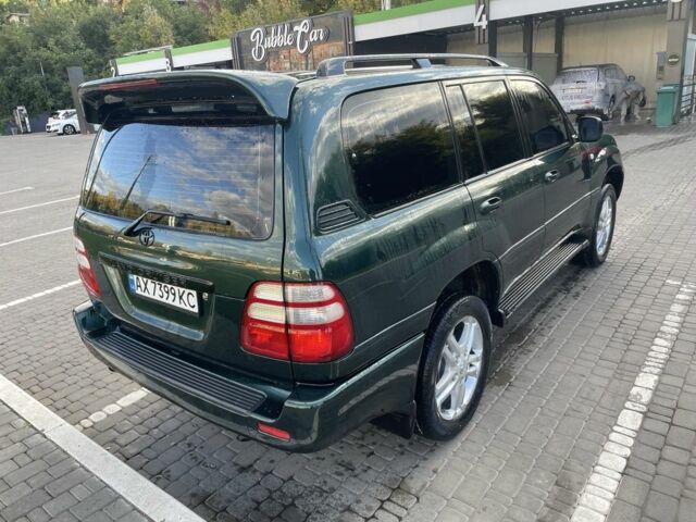 Зеленый Тойота Ленд Крузер 100, объемом двигателя 4.7 л и пробегом 300 тыс. км за 12000 $, фото 2 на Automoto.ua