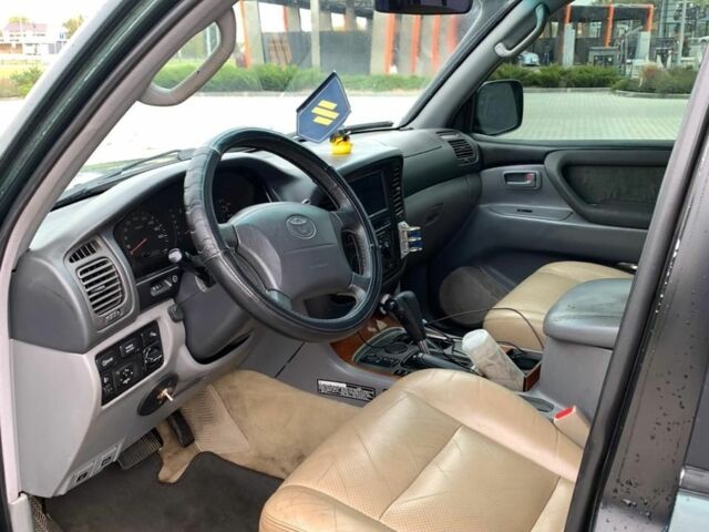 Зеленый Тойота Ленд Крузер 100, объемом двигателя 4.2 л и пробегом 460 тыс. км за 13999 $, фото 4 на Automoto.ua