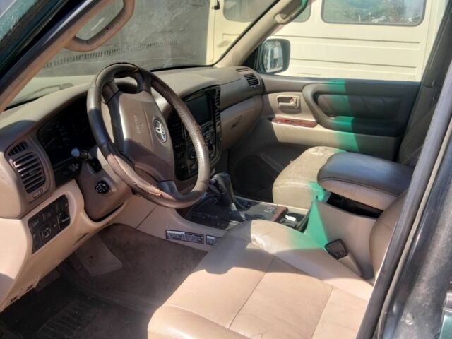 Зеленый Тойота Ленд Крузер 100, объемом двигателя 4.7 л и пробегом 300 тыс. км за 8600 $, фото 2 на Automoto.ua