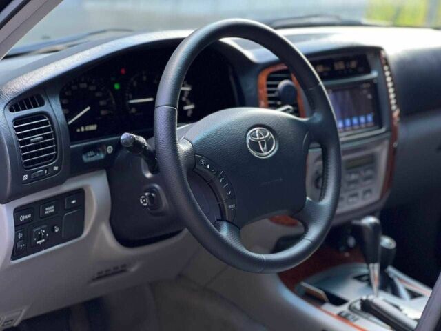 Зелений Тойота Ленд Крузер 100, об'ємом двигуна 4.2 л та пробігом 618 тис. км за 14490 $, фото 13 на Automoto.ua