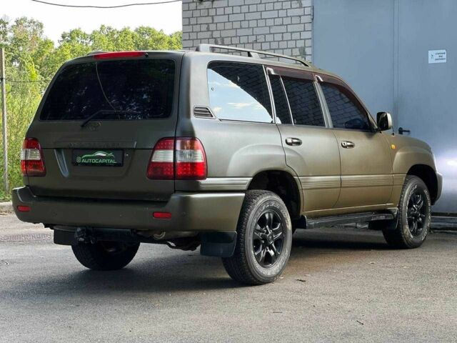 Зелений Тойота Ленд Крузер 100, об'ємом двигуна 4.2 л та пробігом 618 тис. км за 14490 $, фото 6 на Automoto.ua