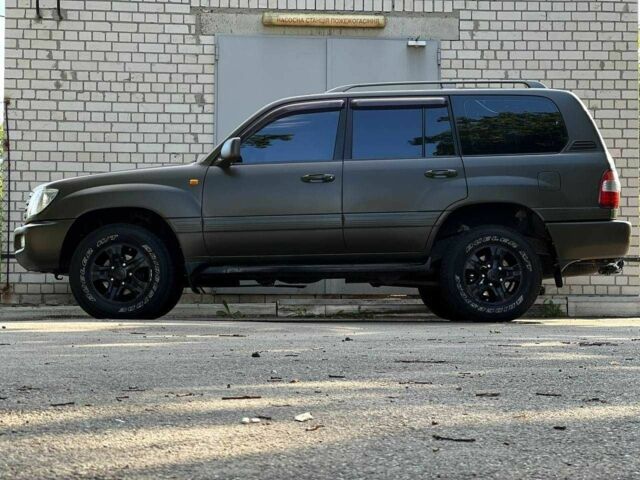 Зелений Тойота Ленд Крузер 100, об'ємом двигуна 4.2 л та пробігом 618 тис. км за 14490 $, фото 3 на Automoto.ua
